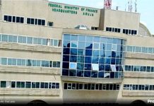 SHOTS FIRED AS PROTESTING FG CONTRACTORS BLOCK FINANCE MINISTER FROM ENTERING OFFICE