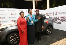 FG REWARDS OUTSTANDING CIVIL SERVANTS WITH CARS, CASH AS SOME MINISTRIES REFUSE TO SEND NOMINEES