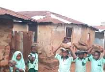 WIKE IS WORKING: PUPILS CARRY STONES TO SCHOOL TO SIT IN ABAJI, NO CHAIRS OR DESKS, SEE PICS